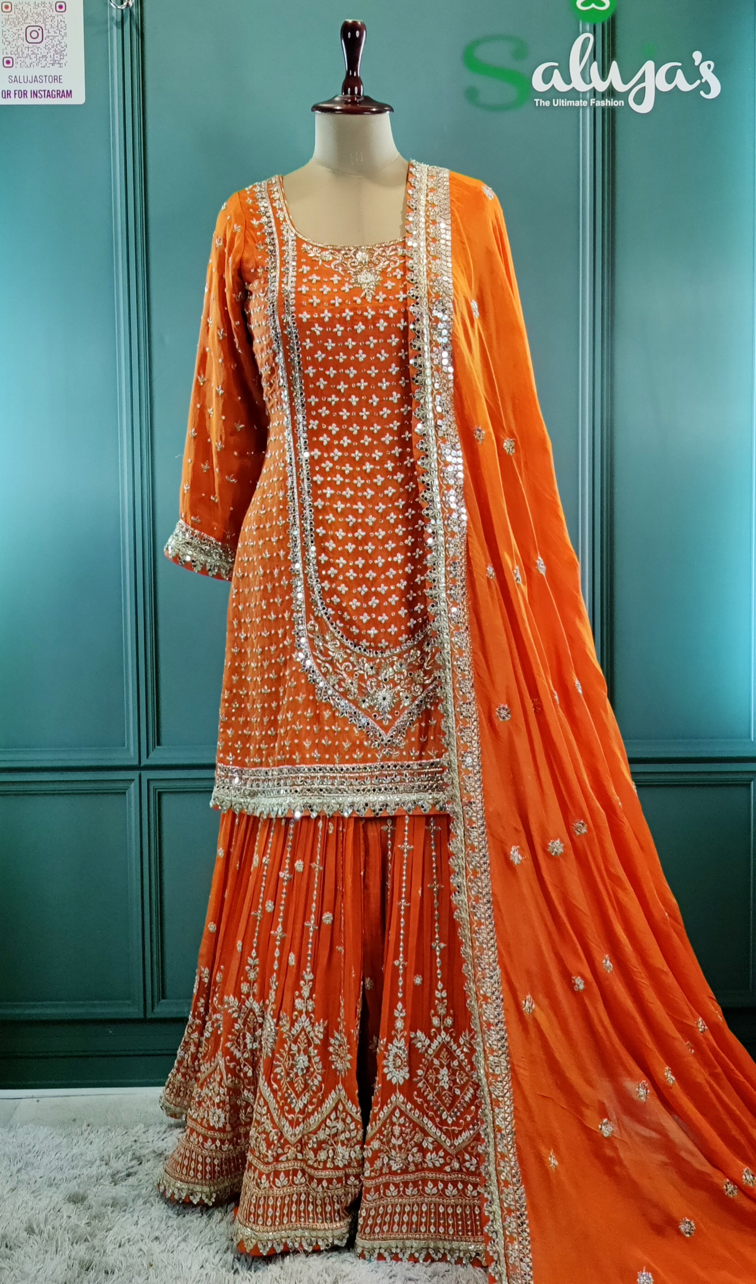 Vibrant Orange Gharara Suit with Traditional Detailing