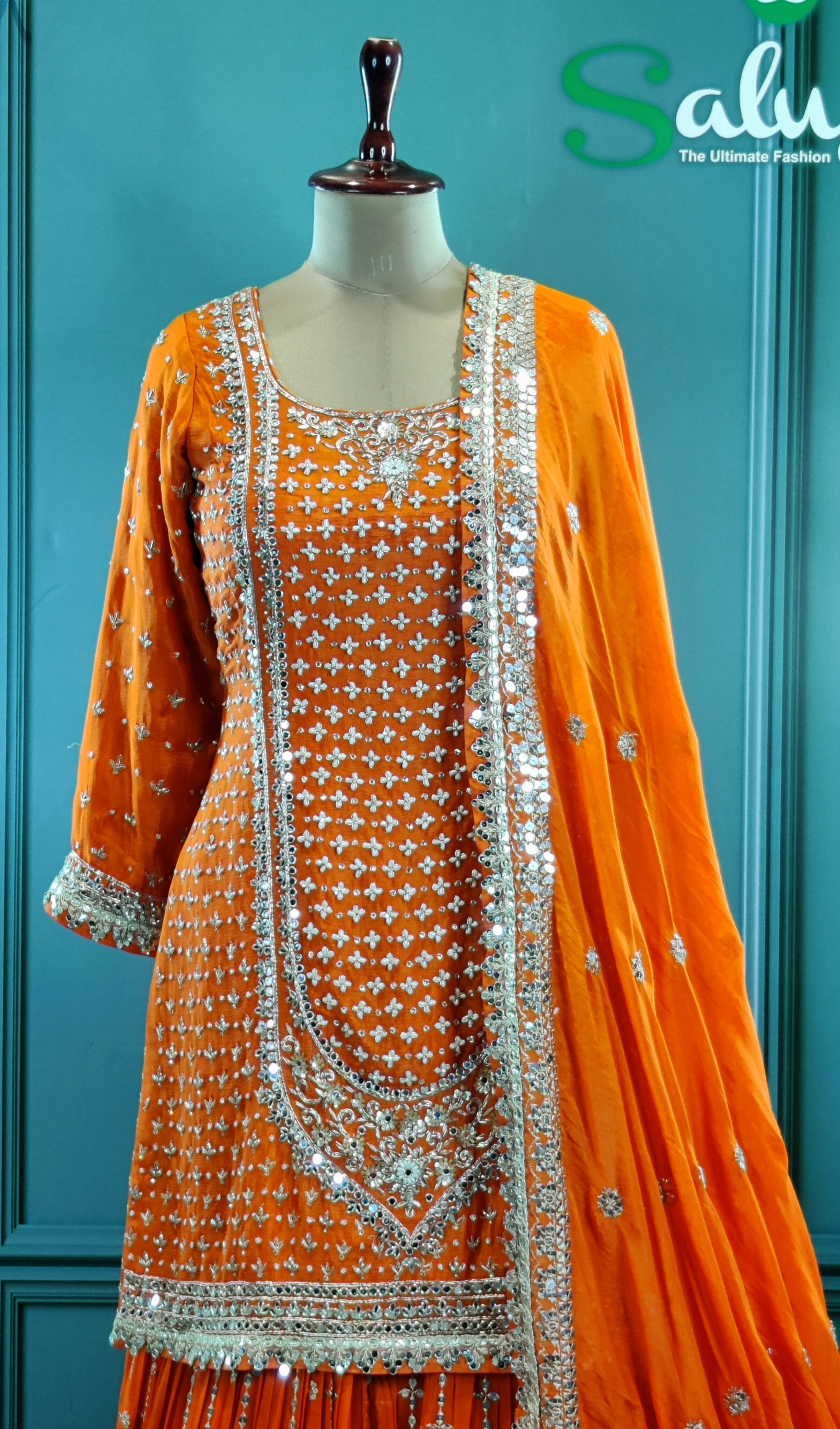 Vibrant Orange Gharara Suit with Traditional Detailing