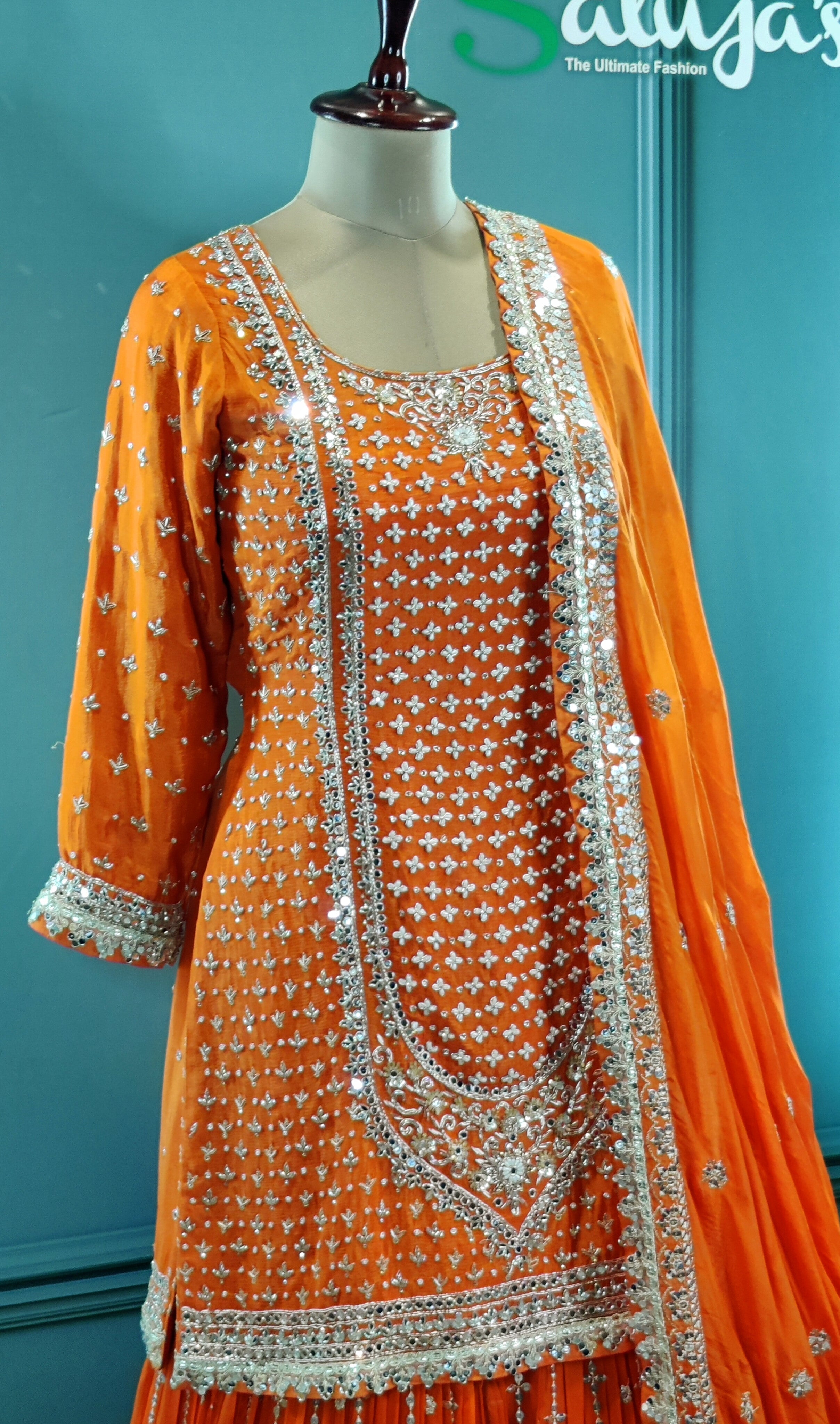 Vibrant Orange Gharara Suit with Traditional Detailing