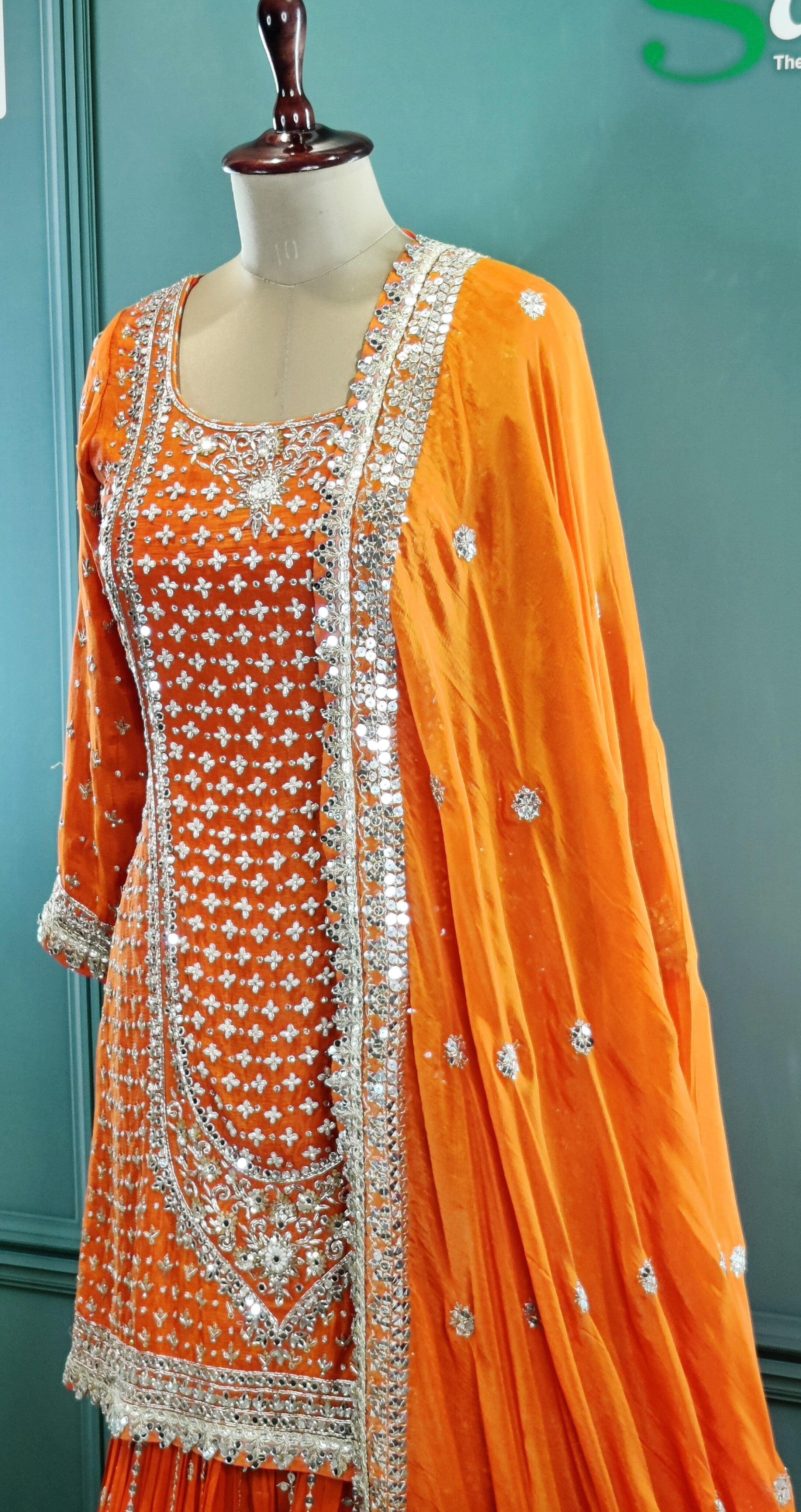 Vibrant Orange Gharara Suit with Traditional Detailing